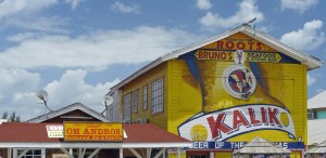 Yellow building housing a restaurant at Arawak Cay, Bahamas