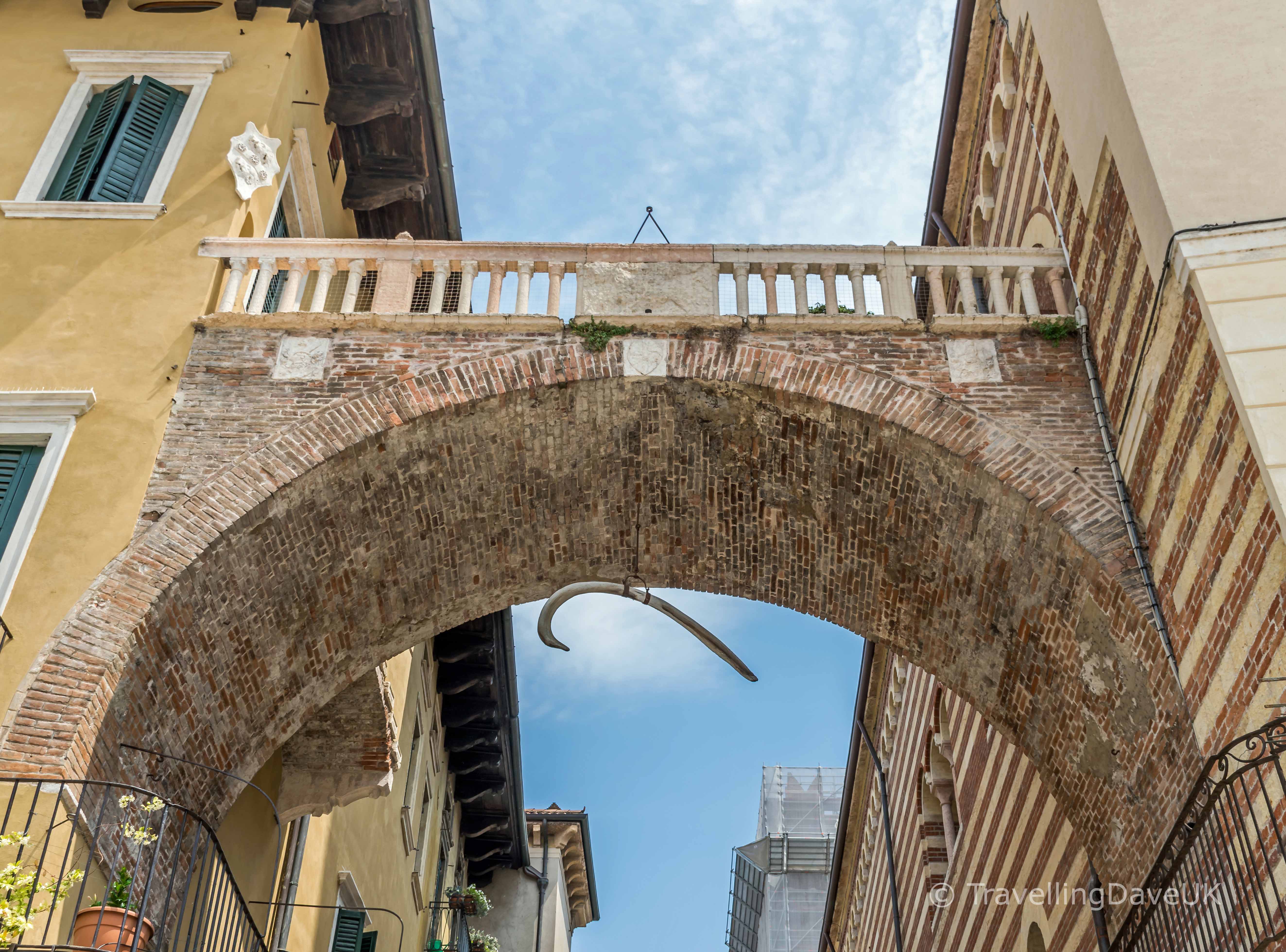 Bone hanging from Arco della Costa in Verona