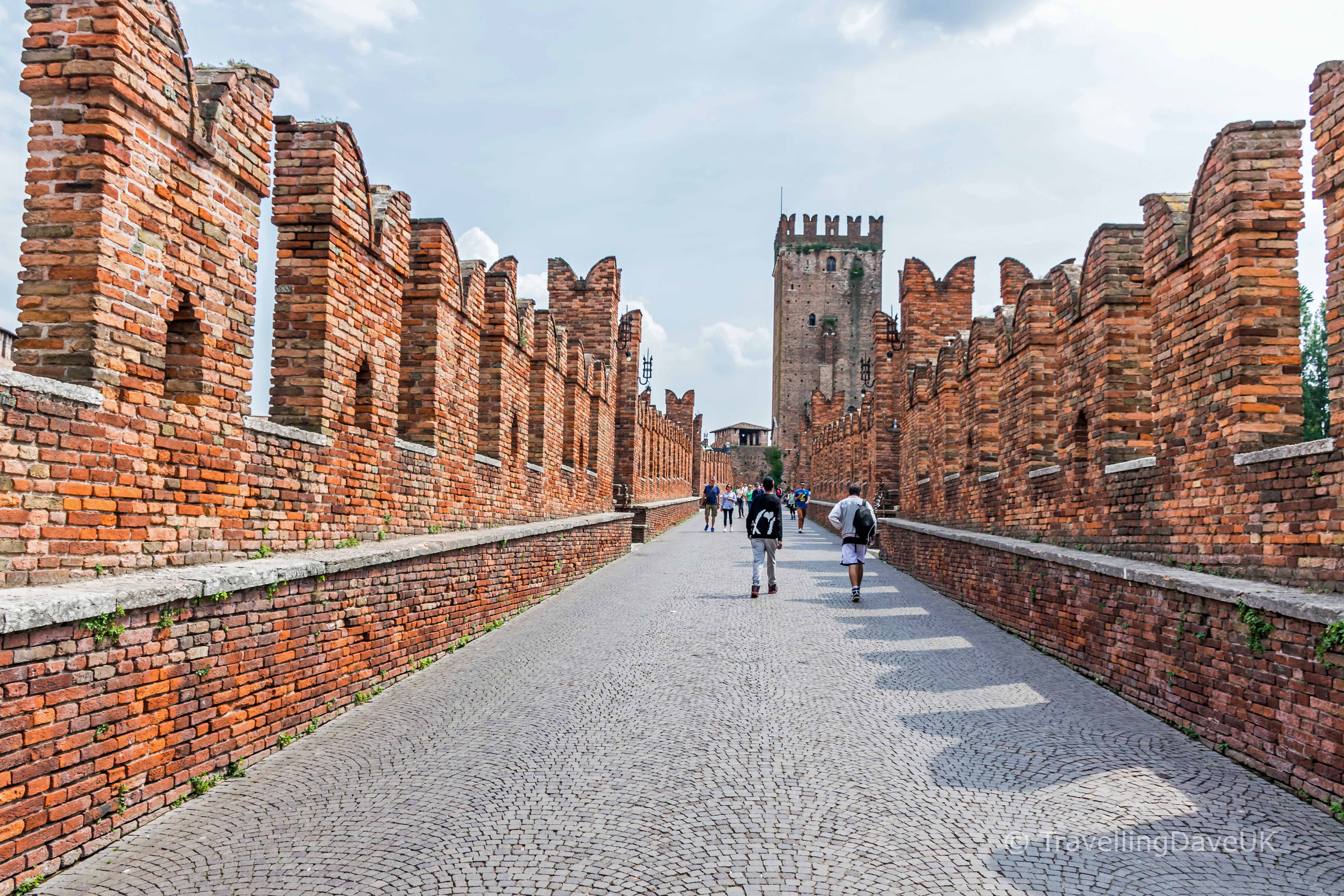 People on the Castelvecchio Bridge in Verona