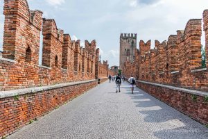 People on the Castelvecchio Bridge in Verona