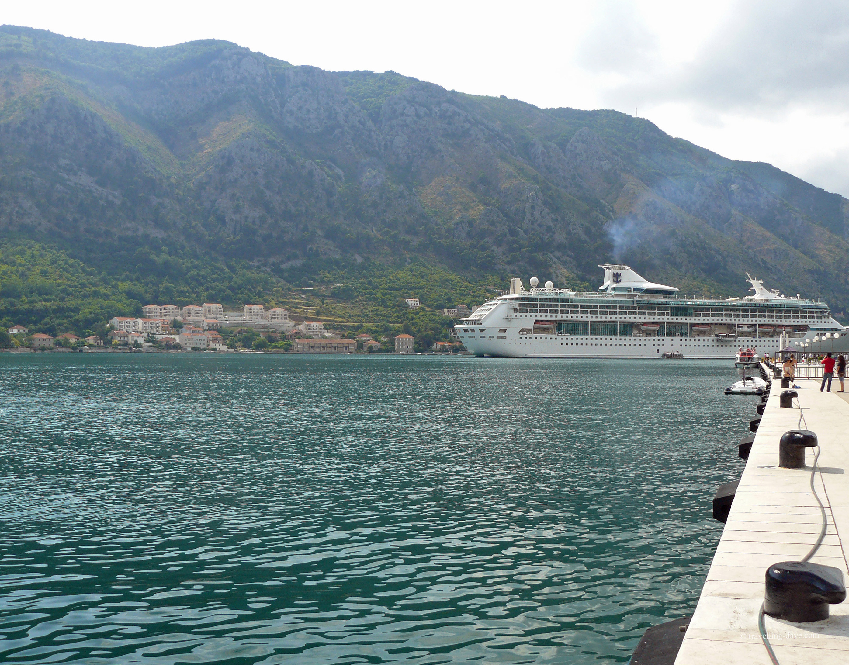 A cruise ship sailing on Kotor Bay