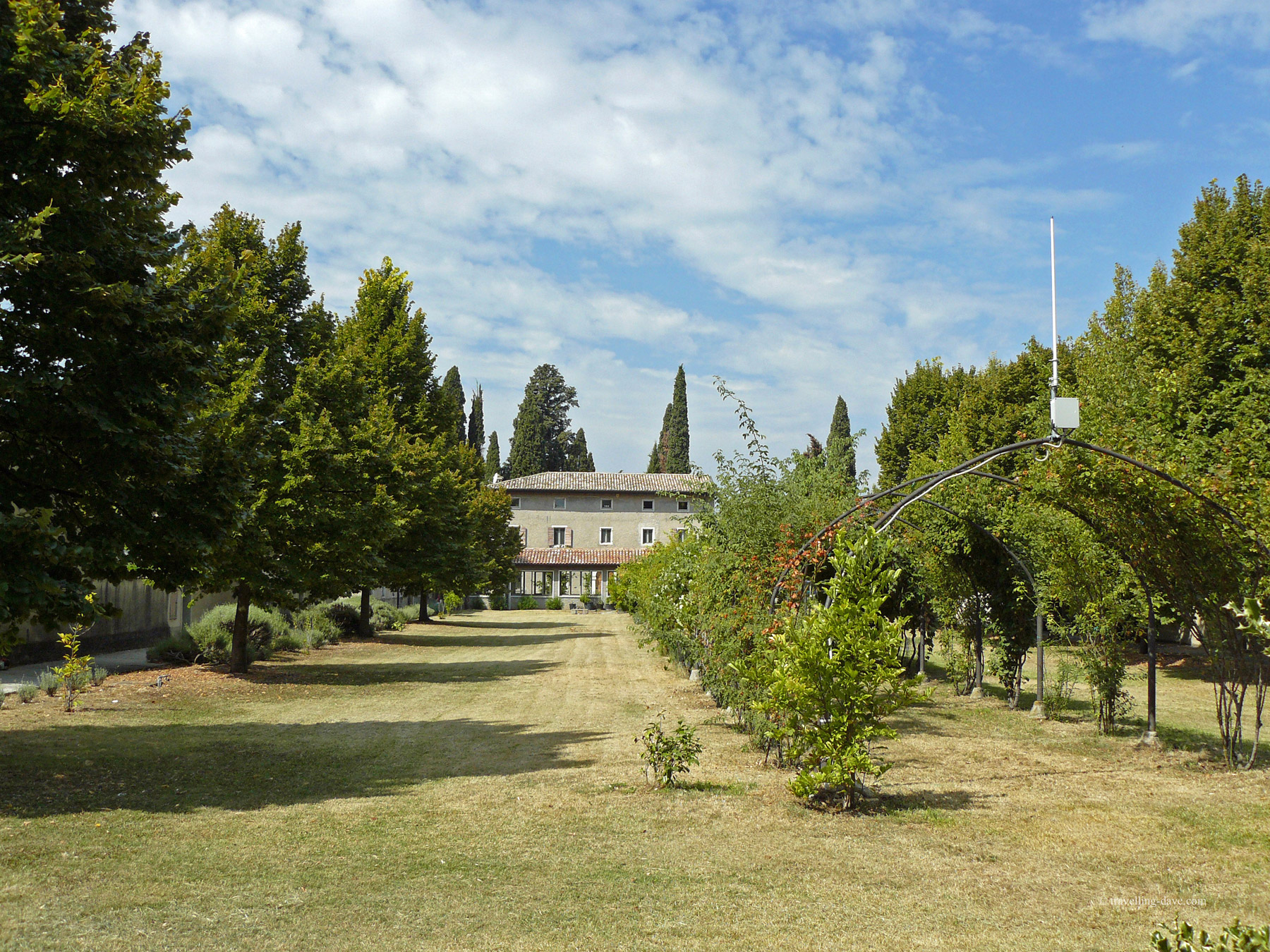 Building and trees at St.George's hermitage in Garda, Italy