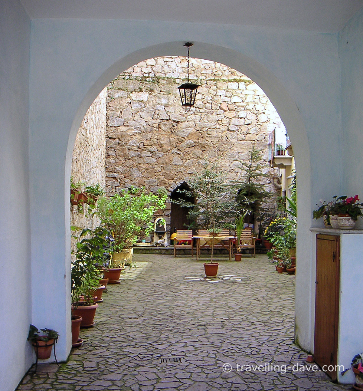 Archway courtyard entrance in Orgosolo