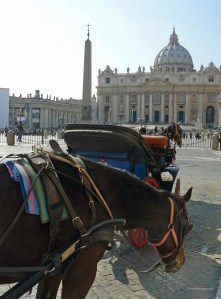 Basilica and horses in St.Peter's Square