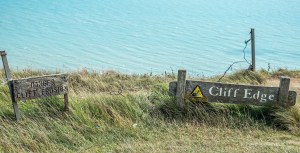 View of the warning signs at Beachy Head cliff edge