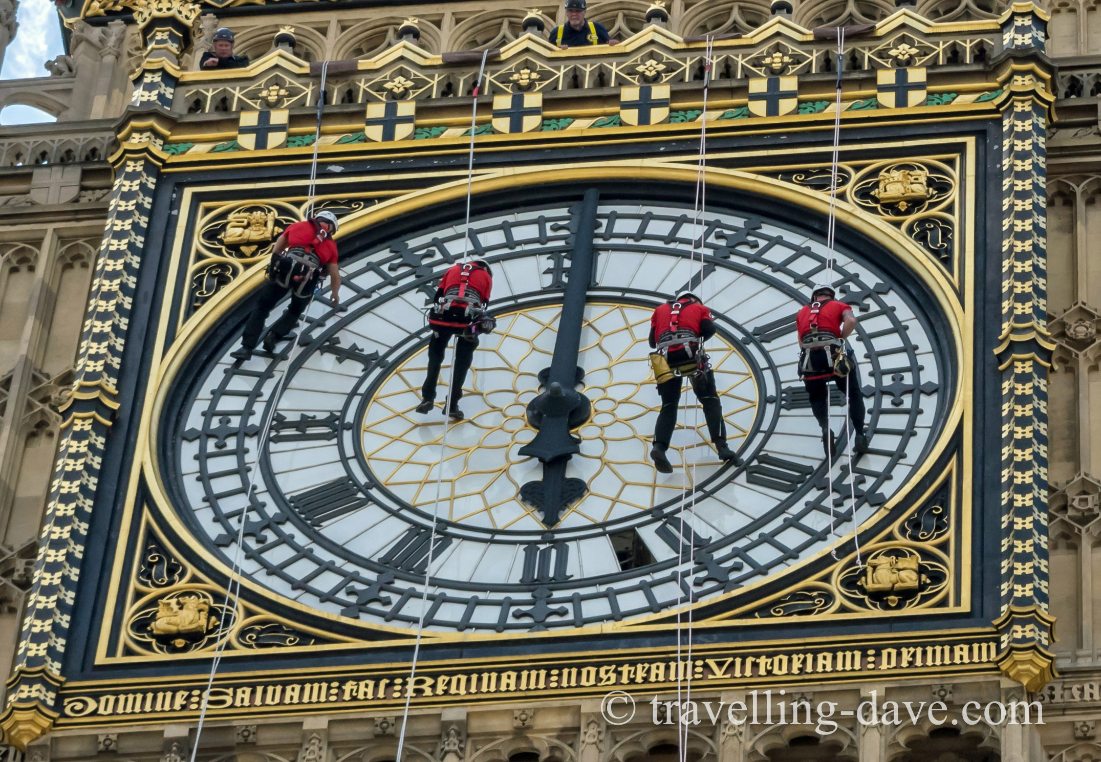 Four cleaners on the Elizabeth Tower clock face