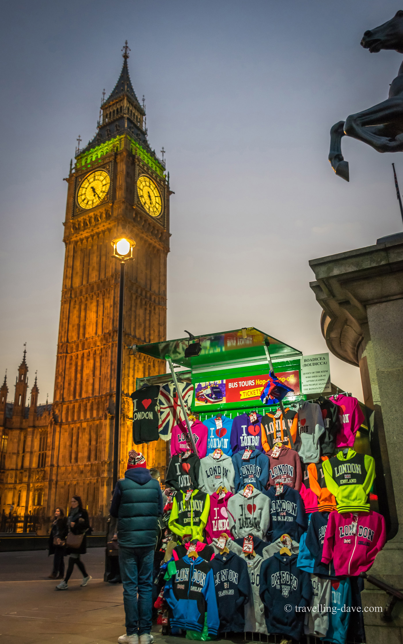 View of a t-shirts souvenir stall in the evening