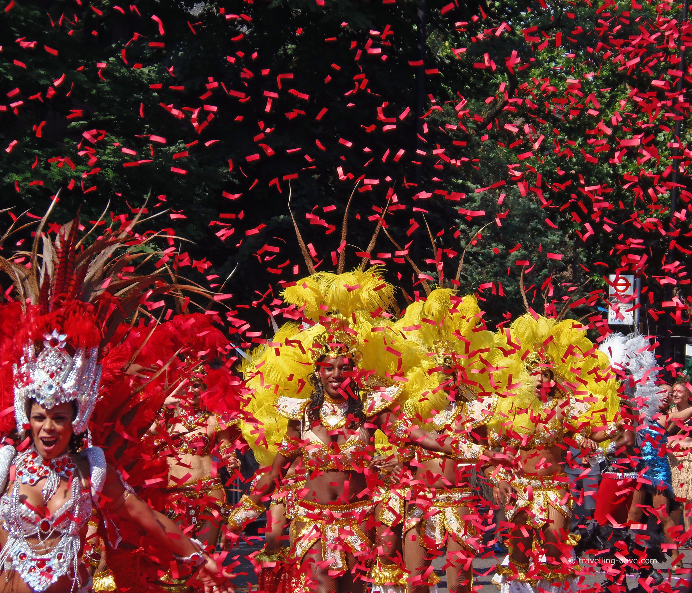 Dancers and red confetti in Notting Hill