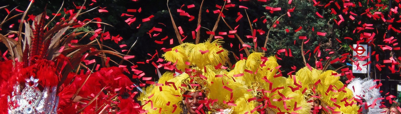 Dancers and red confetti in Notting Hill