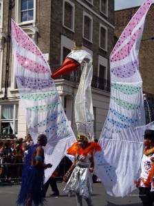 A man wearing a swan themed costume