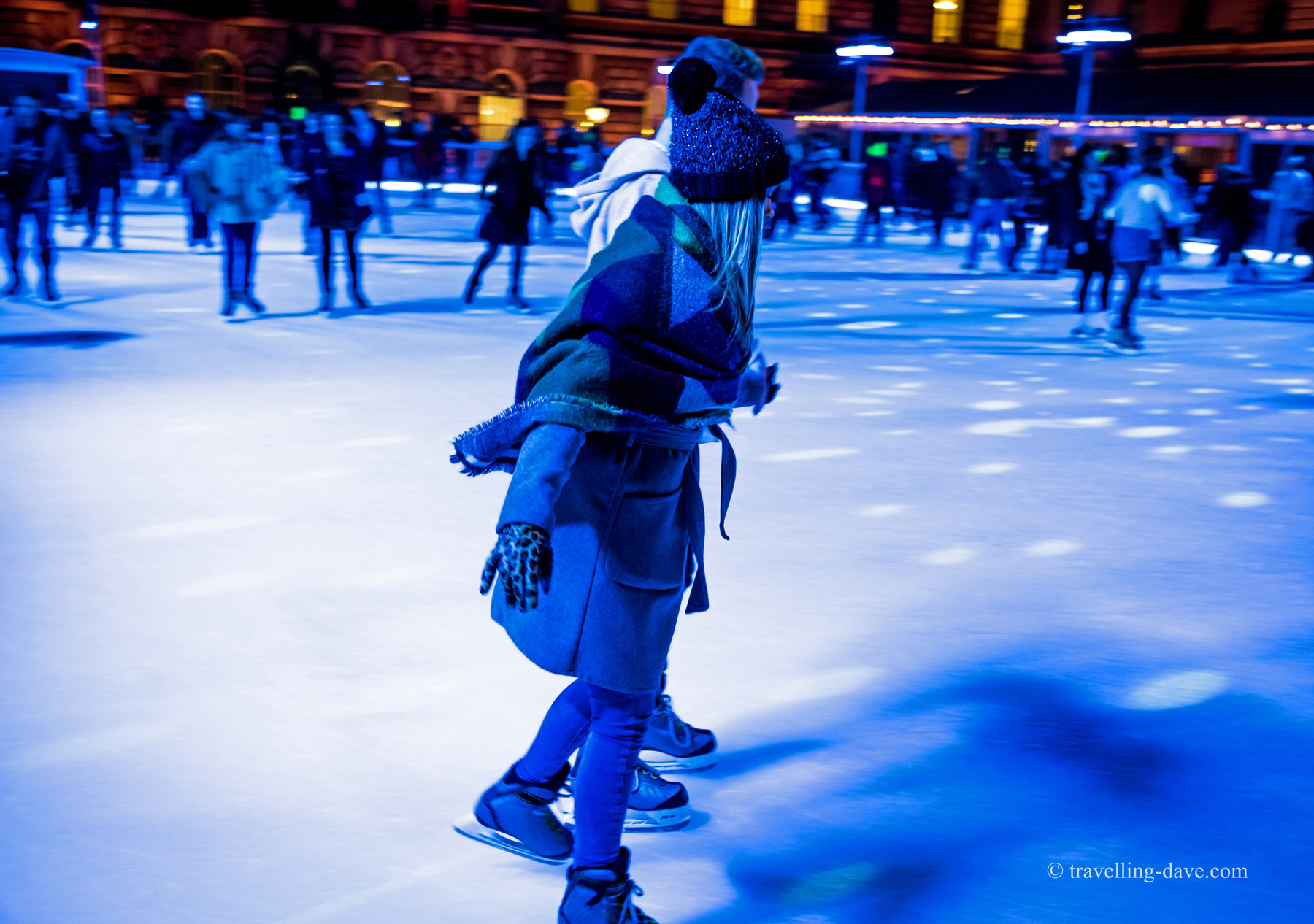 Two people ice skating