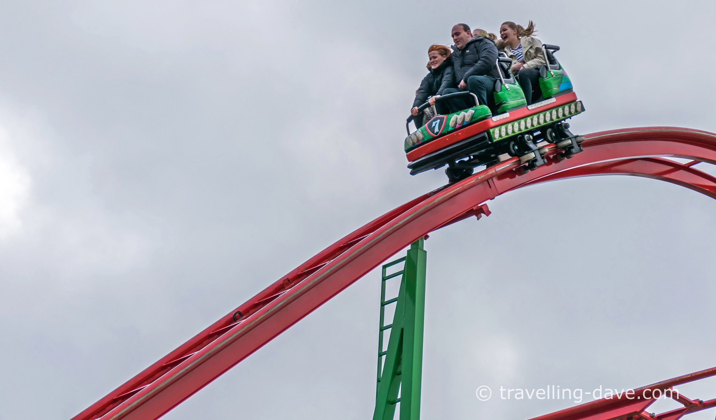 People on a rollercoaster car
