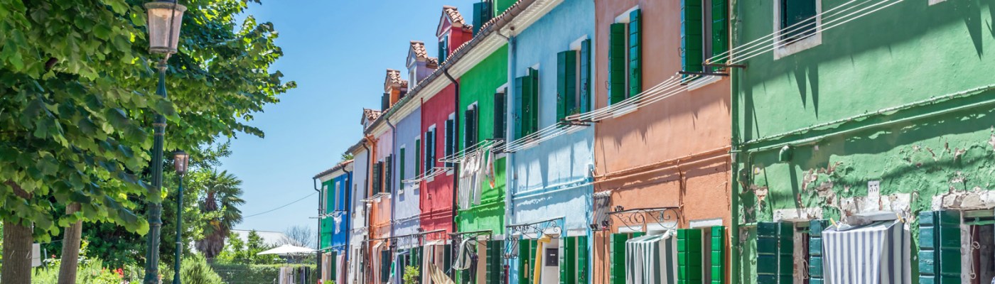 View of a row of colorful houses in Burano
