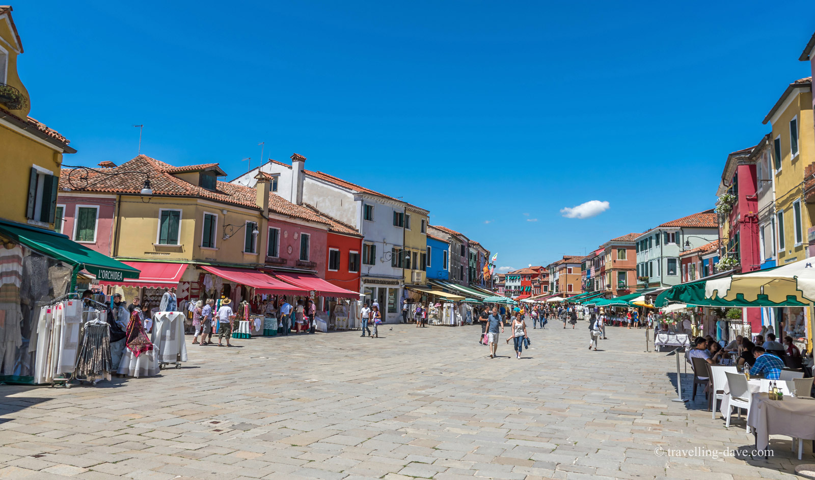 People walking on Burano's main street