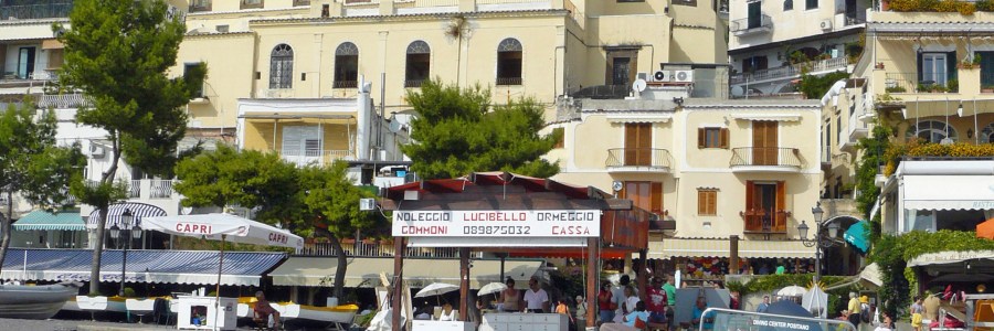 View of the beach and the cathedral in Positano