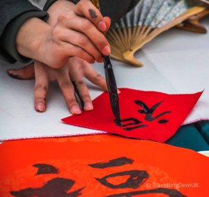 Black writings on red paper