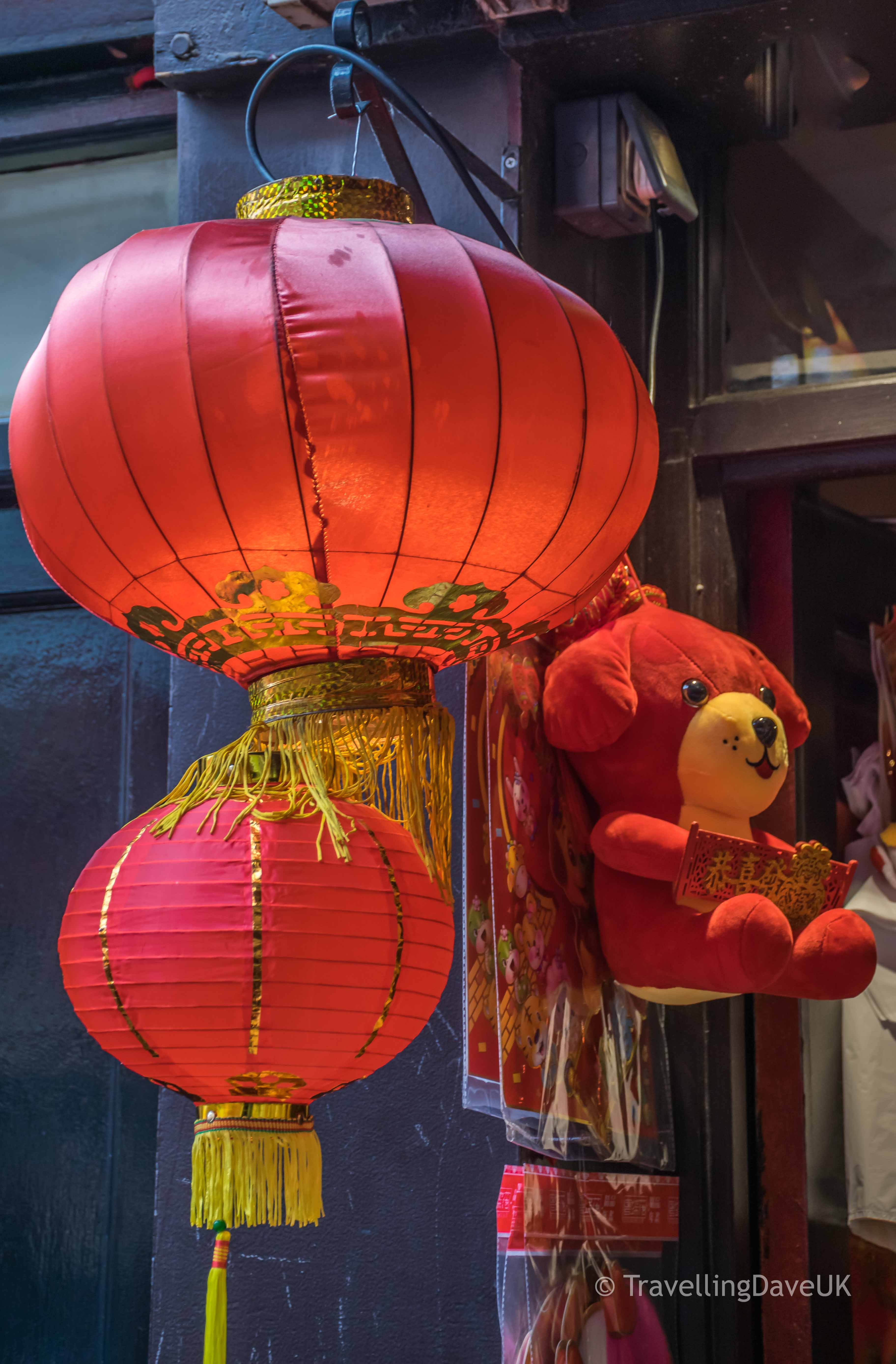 Red lanterns and a red toy dog in Chinatown